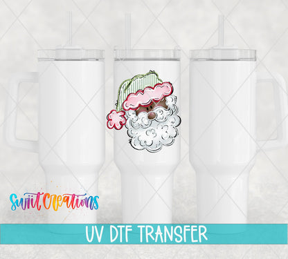 Pink and Green Santa Face UV DTF transfer on white 40 oz tumblers