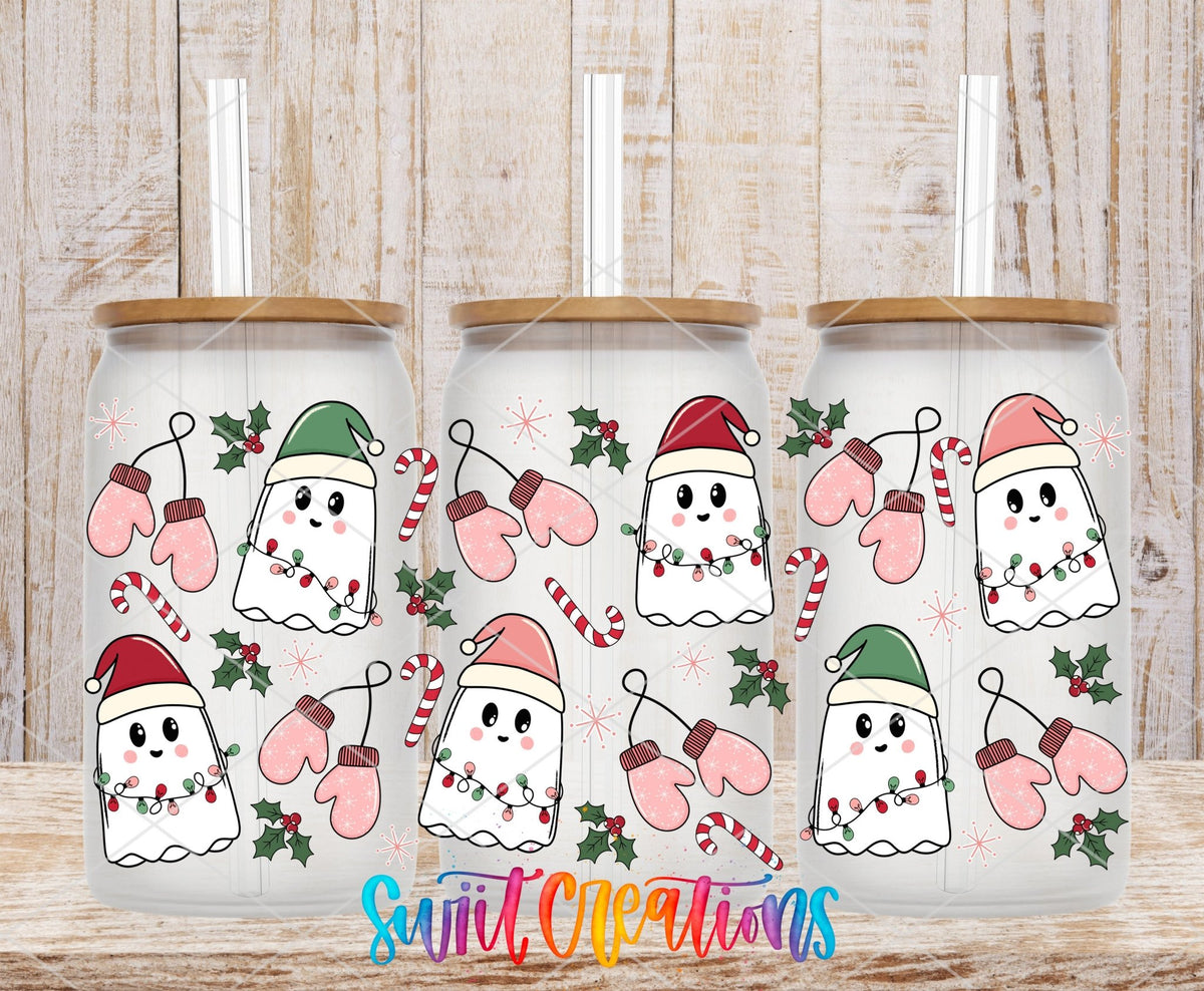 Pink Christmas Ghosts lights and mittens UV DTF full wrap on three clear glass cans with bamboo lids