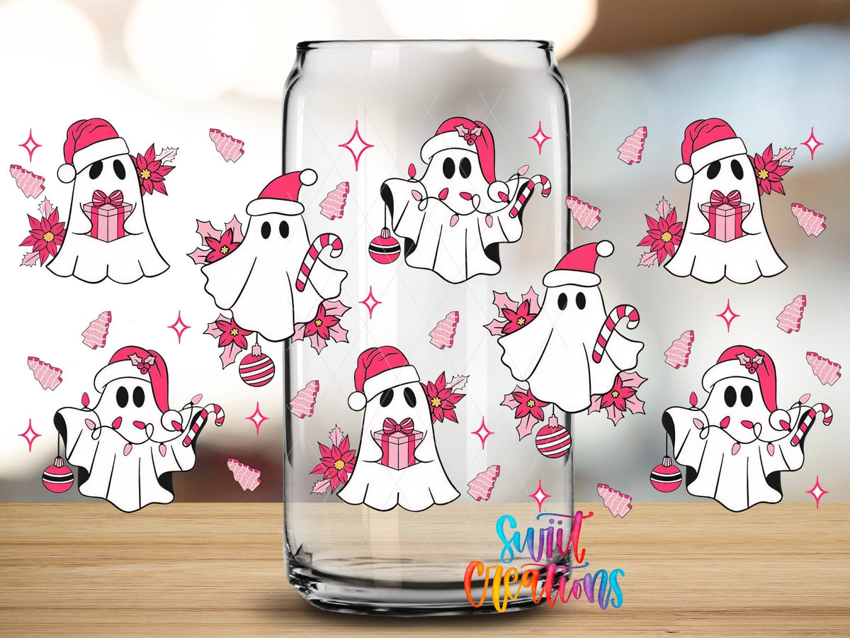 Close-up of the Pink Christmas Ghosts poinsettias and gifts UV DTF full wrap on a clear glass can