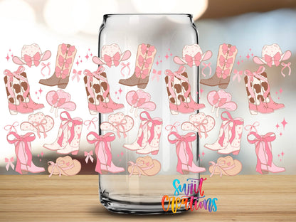 Close-up of the Pink Cowgirl Coquette UV DTF full wrap on a clear glass can