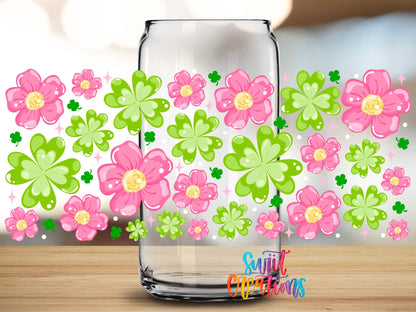 Close-up of the Pink Flowers and Clovers UV DTF full wrap on a clear glass can