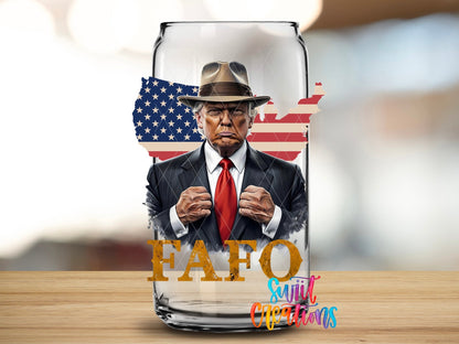 Close-up of the FAFO Trump UV DTF transfer on a clear glass can
