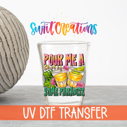 Pour Me a Shot of Some Paradise UV DTF transfer on a clear shot glass with the Swiit Creations logo and UV DTF Transfer banner