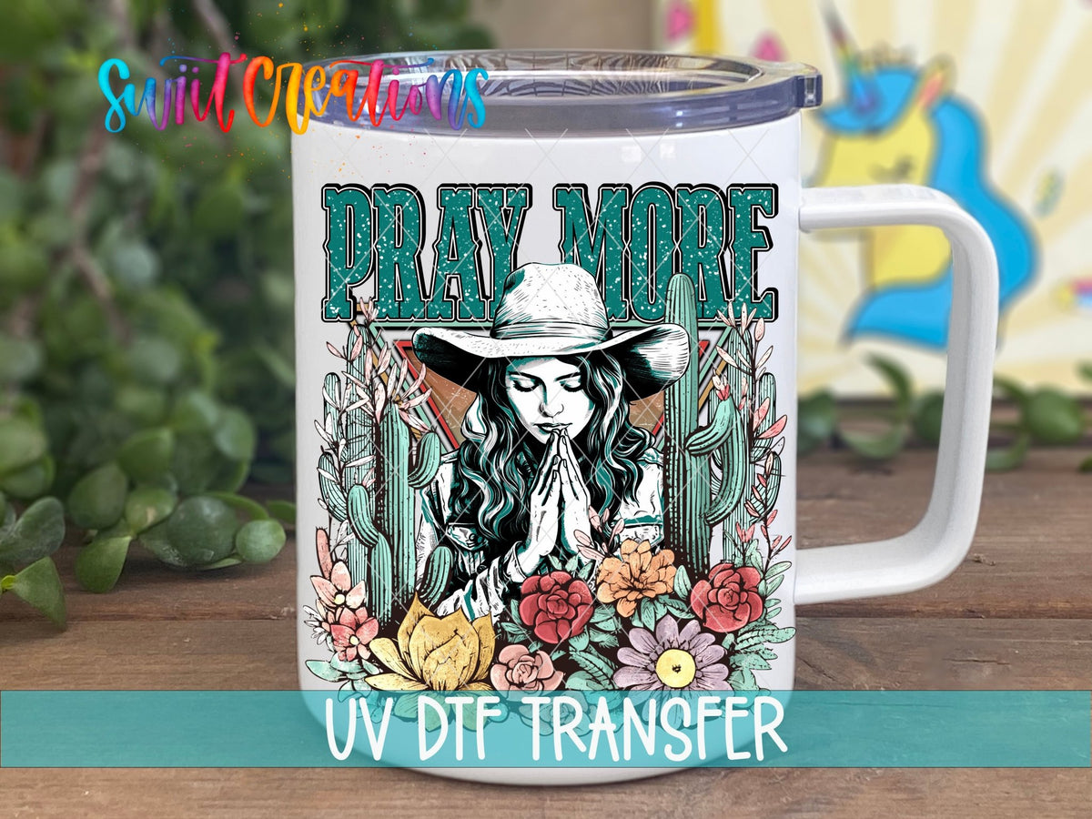 Pray More UV DTF transfer on a white stainless steel mug with a lid