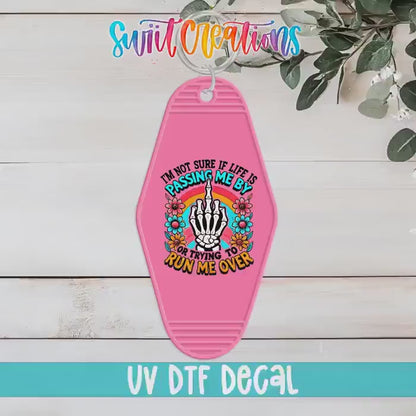 Video of the Passing Me By or Running Me Over motel keychain UV DTF transfer