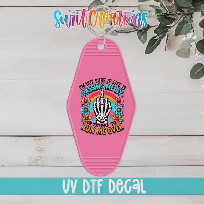 Video of the Passing Me By or Running Me Over motel keychain UV DTF transfer
