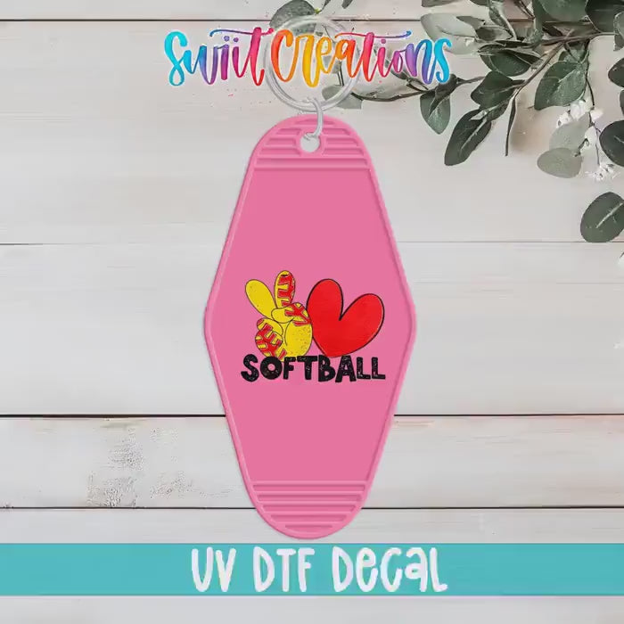 Video of the Peace Love Softball motel keychain UV DTF transfer