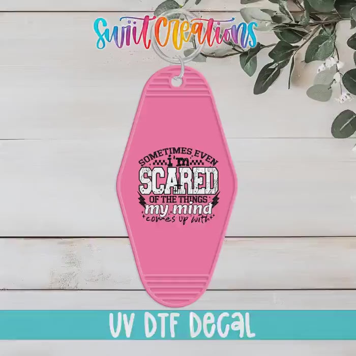 Video of the Sometimes Even I'm Scared motel keychain UV DTF transfer