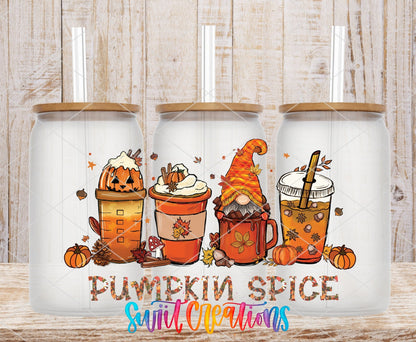 Pumpkin Spice UV DTF wrap on three clear glass cans with bamboo lids