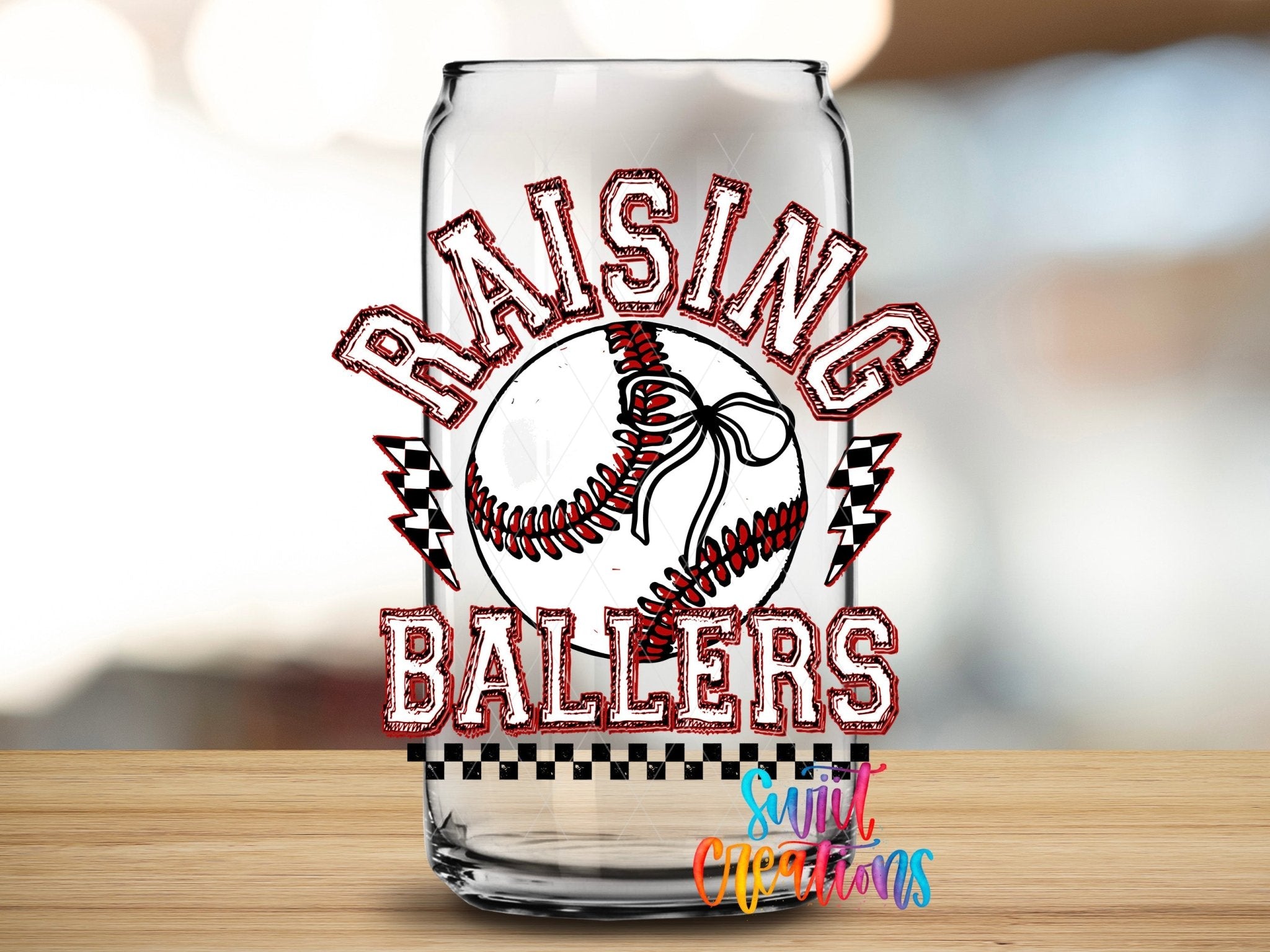 Raising Ballers Baseball UV DTF transfer applied to a clear glass can from Swiit Creations