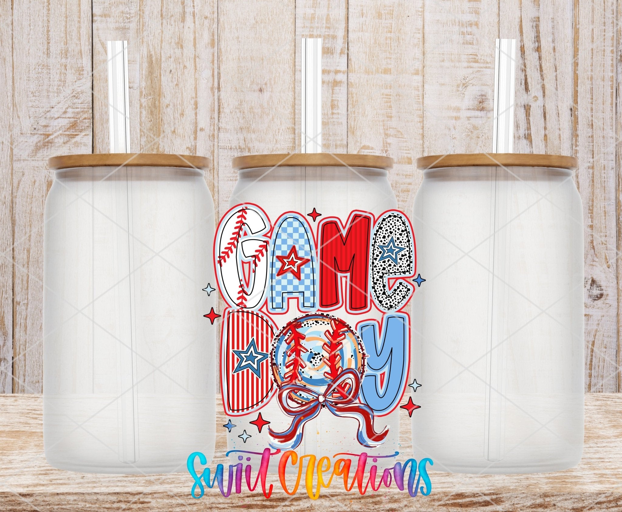 Red White and Blue Game Day Baseball UV DTF transfer applied to a clear glass can set from Swiit Creations
