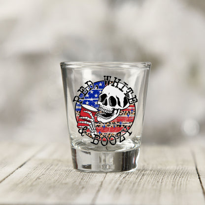 Close-up of the Red White and Boozy UV DTF transfer on a clear shot glass