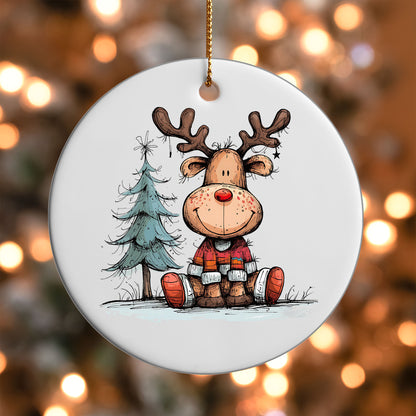 Reindeer by a Pine Tree ornament UV DTF transfer on a round white ornament with a bokeh light background