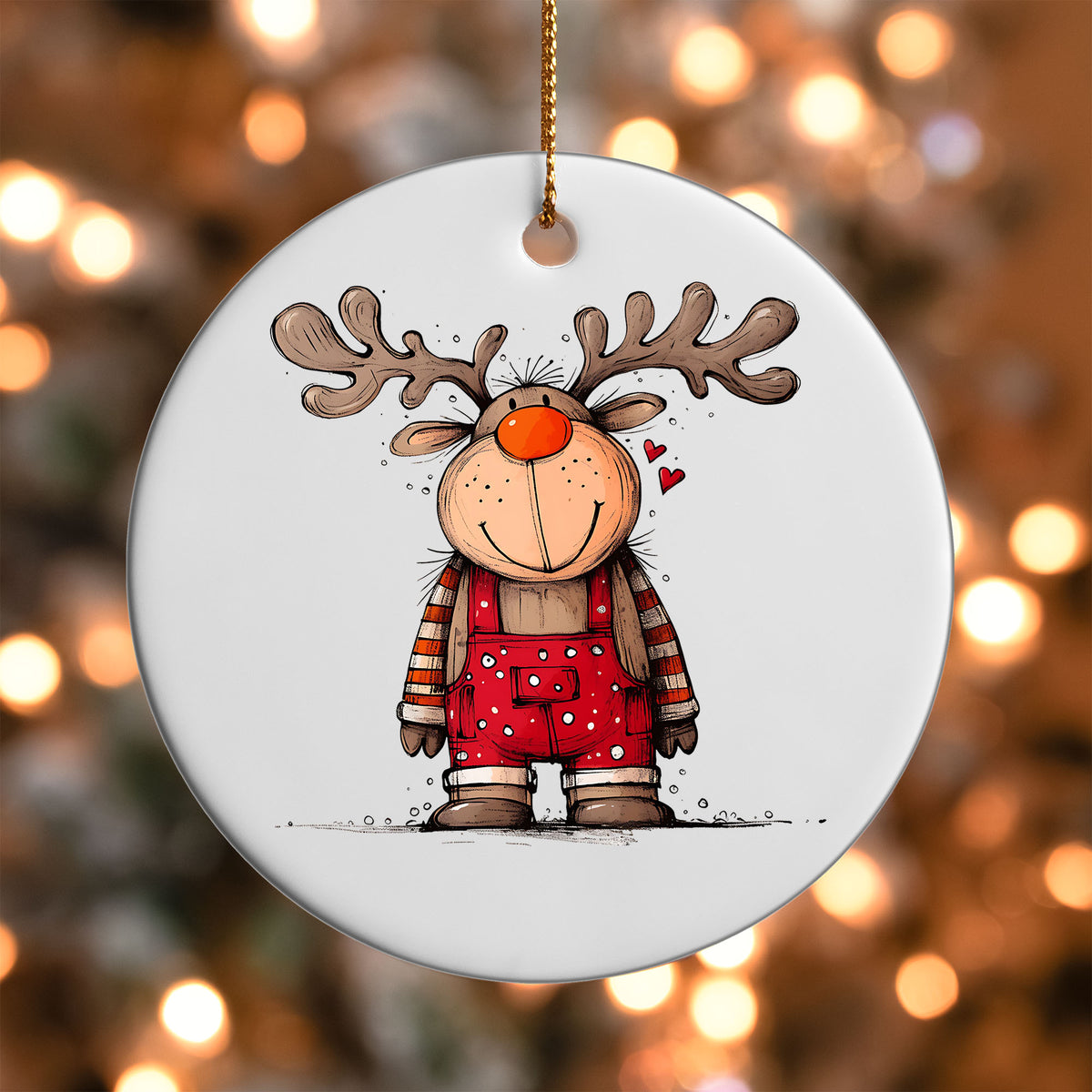 Reindeer in Red Overalls ornament UV DTF transfer on a round white ornament with a bokeh light background