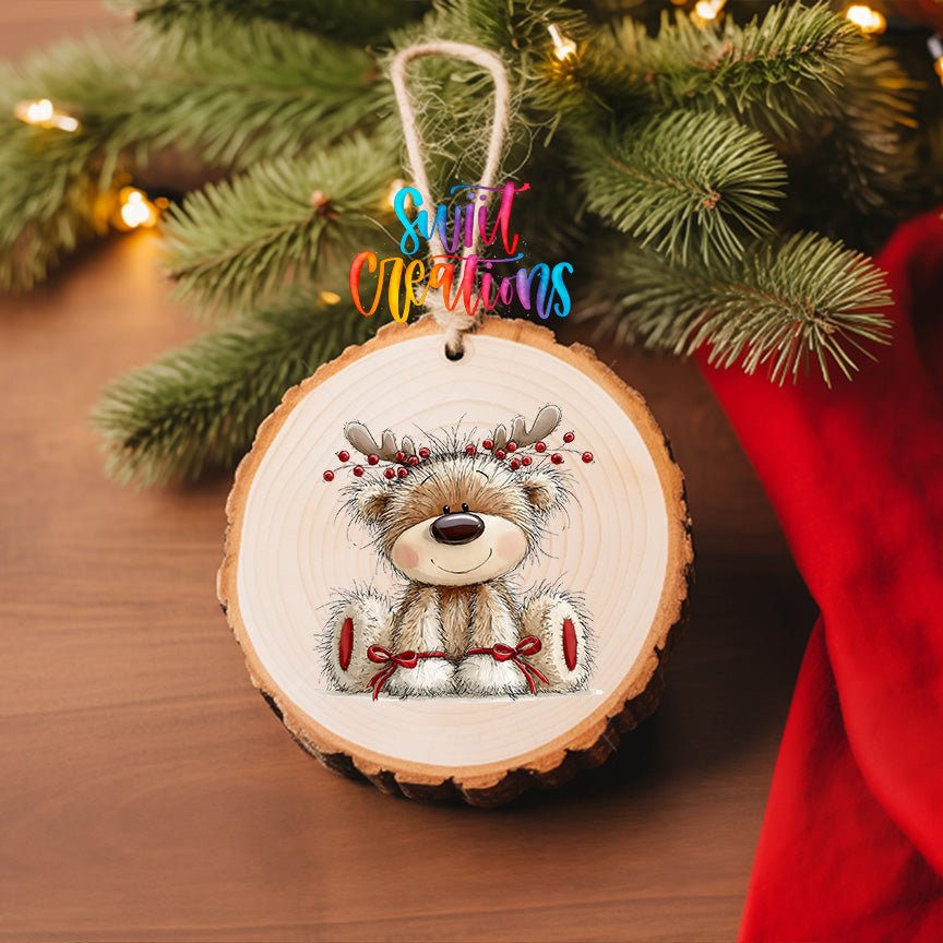 Reindeer Teddy Bear UV DTF transfer on a wood slice ornament with pine branches and a red stocking