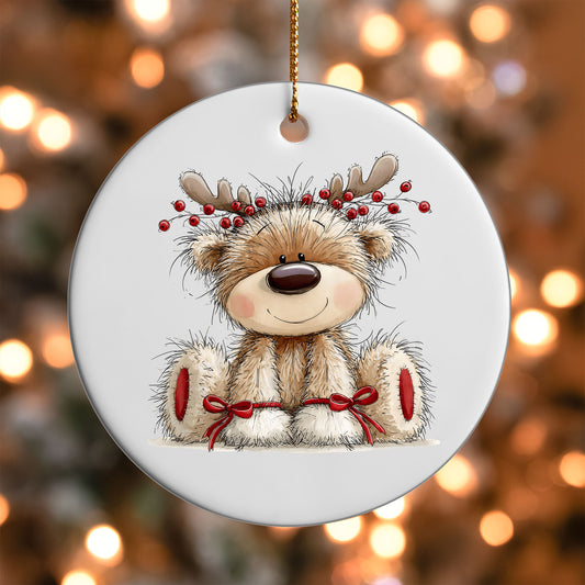 Reindeer Teddy Bear ornament UV DTF transfer on a round white ornament with a bokeh light background