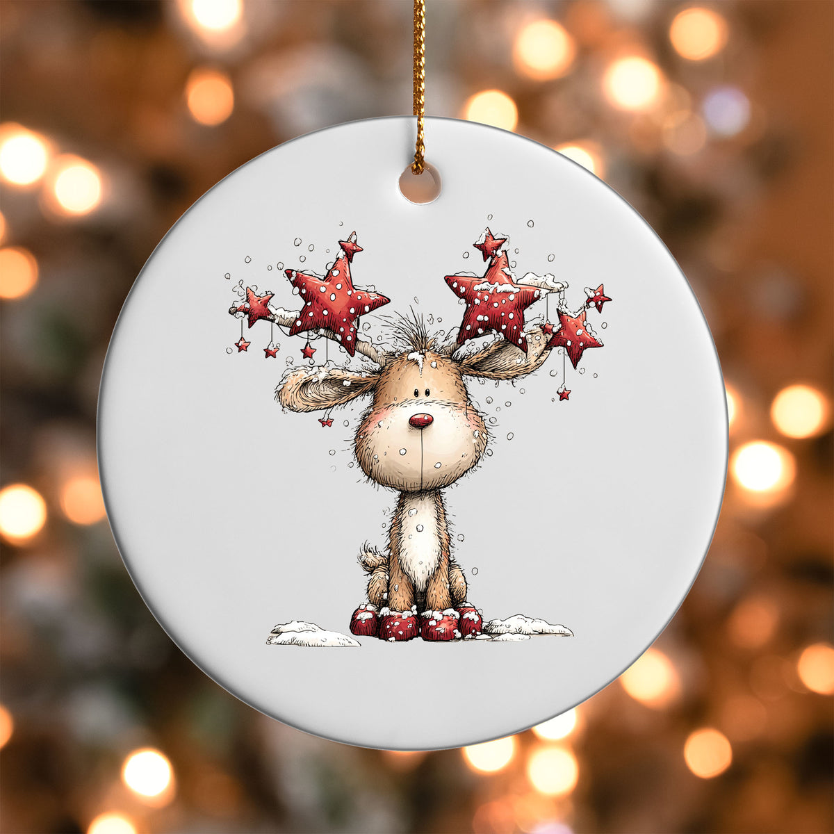 Reindeer with Star Antlers ornament UV DTF transfer on a round white ornament with a bokeh light background