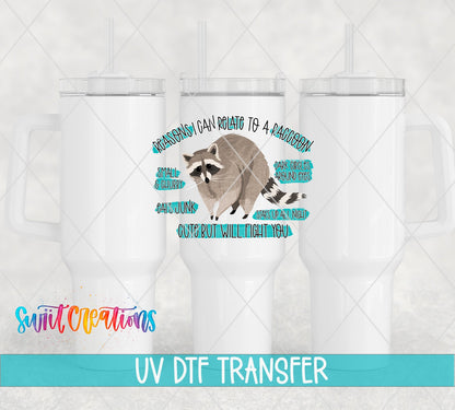 Relate to a Raccoon UV DTF transfer applied to a white tumbler set from Swiit Creations