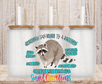 Relate to a Raccoon UV DTF transfer applied to a clear glass can set from Swiit Creations
