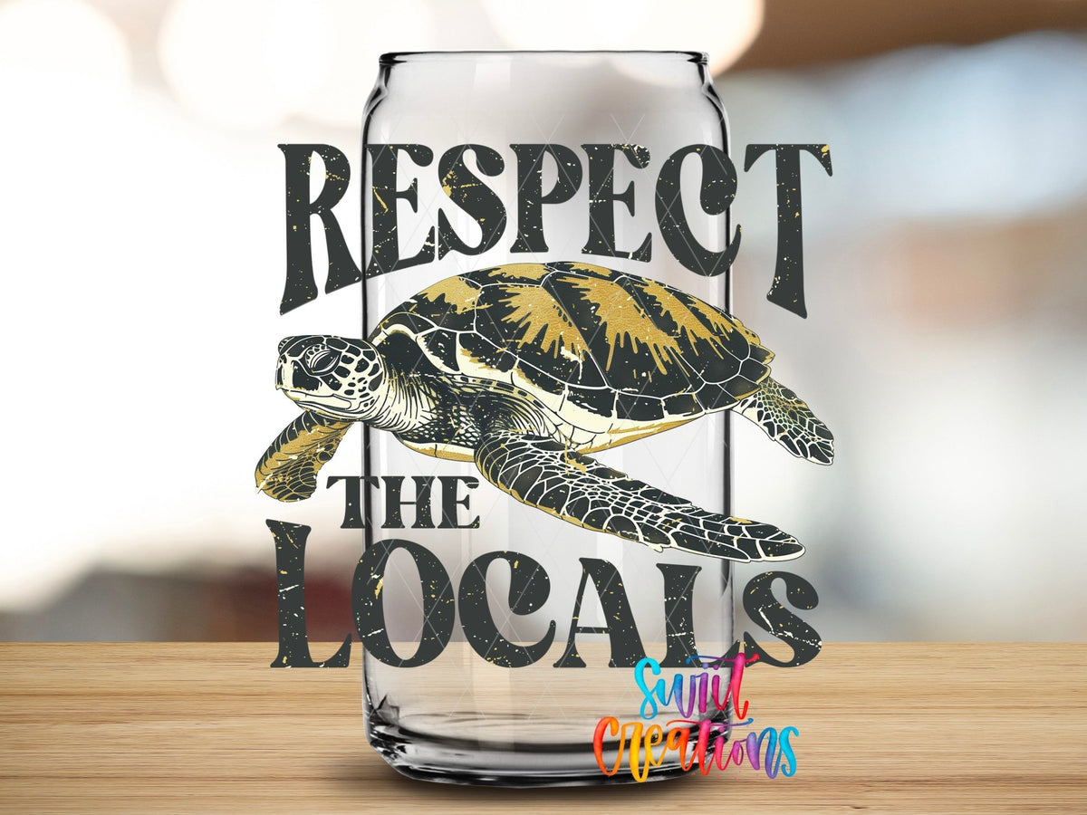 Close-up of the Respect the Locals UV DTF transfer on a clear glass can