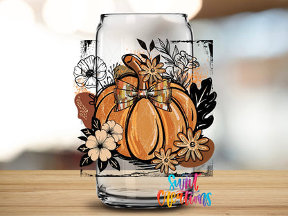 Close-up of the Retro Boho Pumpkin UV DTF transfer on a clear glass can