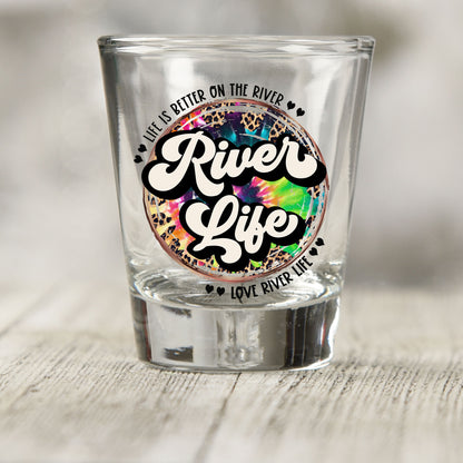 River Life shot glass UV DTF transfer with tie-dye and leopard print circle on a clear shot glass