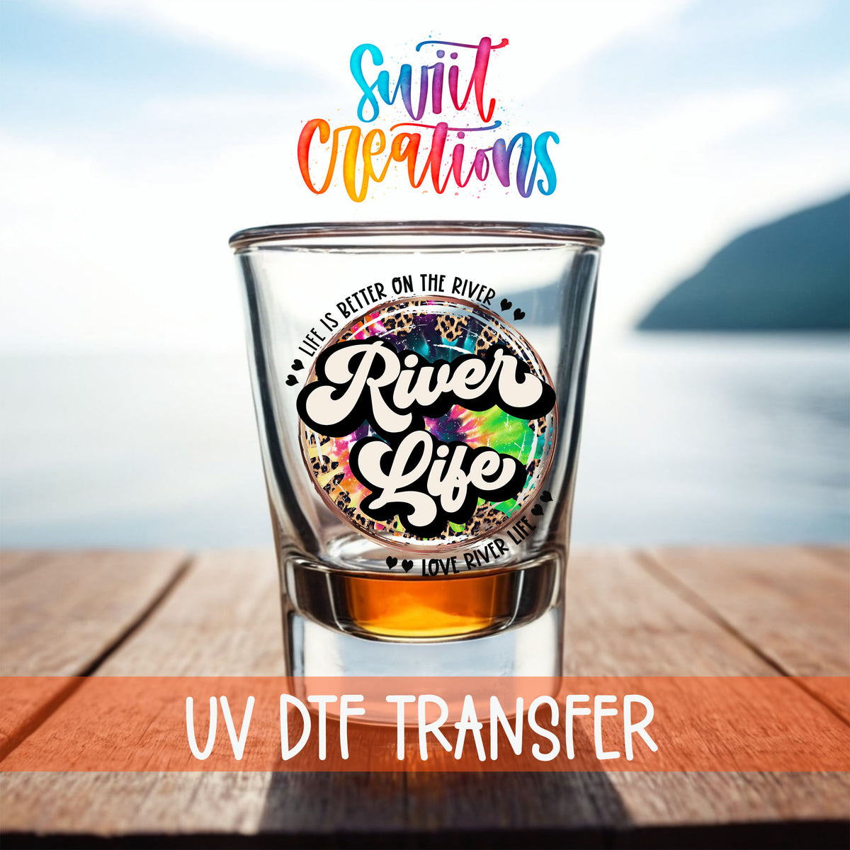River Life shot glass UV DTF transfer on a filled shot glass on a dock by the water