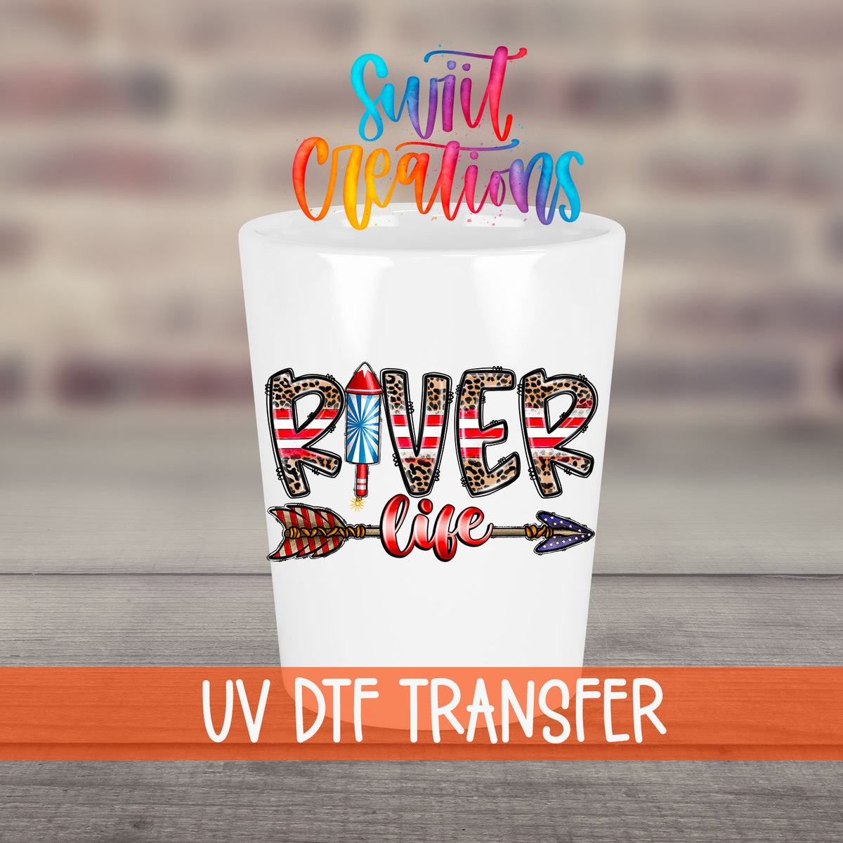 River Life USA UV DTF transfer on a white shot glass in front of a brick wall