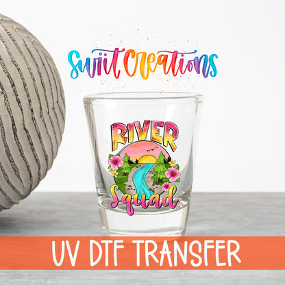 River Squad UV DTF transfer on a clear shot glass with the Swiit Creations logo and UV DTF Transfer banner