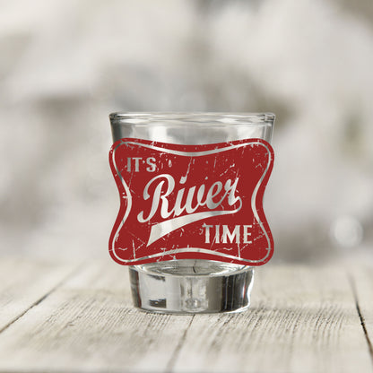Close-up of the River Time UV DTF transfer on a clear shot glass