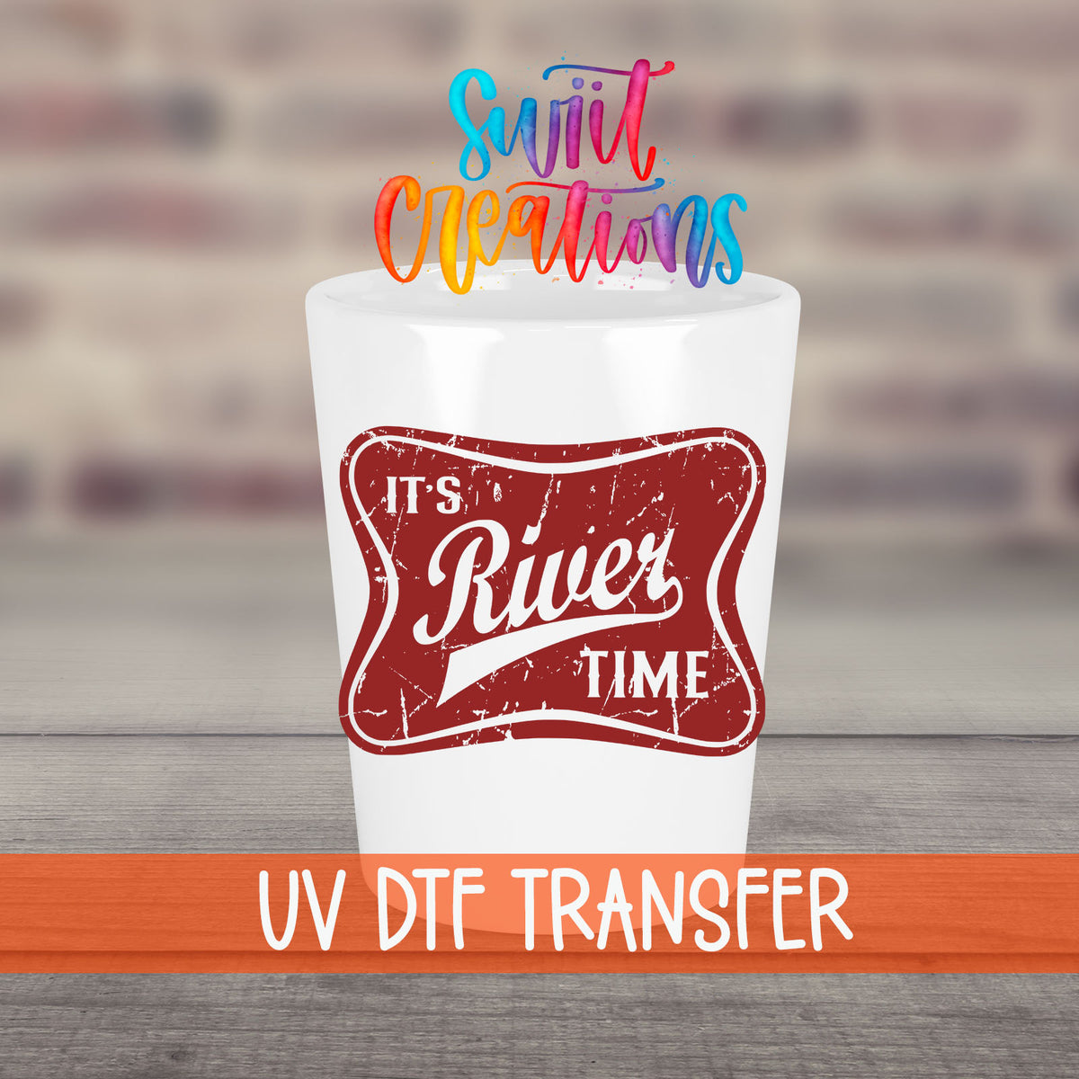 River Time UV DTF transfer on a white shot glass in front of a brick wall