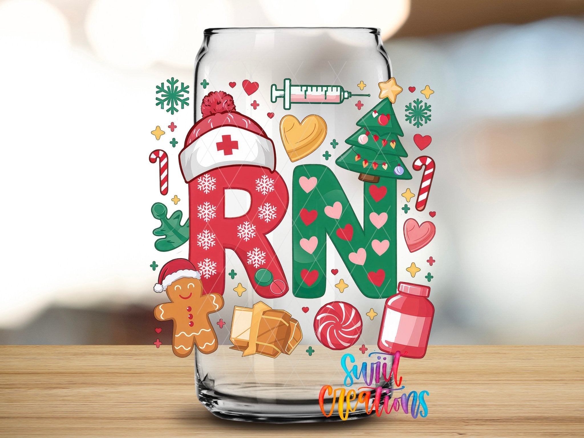 Swiit Creations UV DTF RN Christmas Nurse transfer applied to a clear glass can
