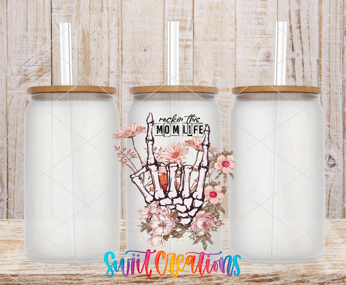 Rockin' the Mom Life UV DTF transfer on frosted glass cans with bamboo lids