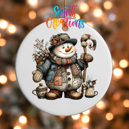 Close-up of the Rustic Patchwork Snowman UV DTF transfer on a round white ornament