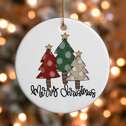 Rustic Tree Trio Merry Christmas ornament UV DTF transfer on a round white ornament with a bokeh light background