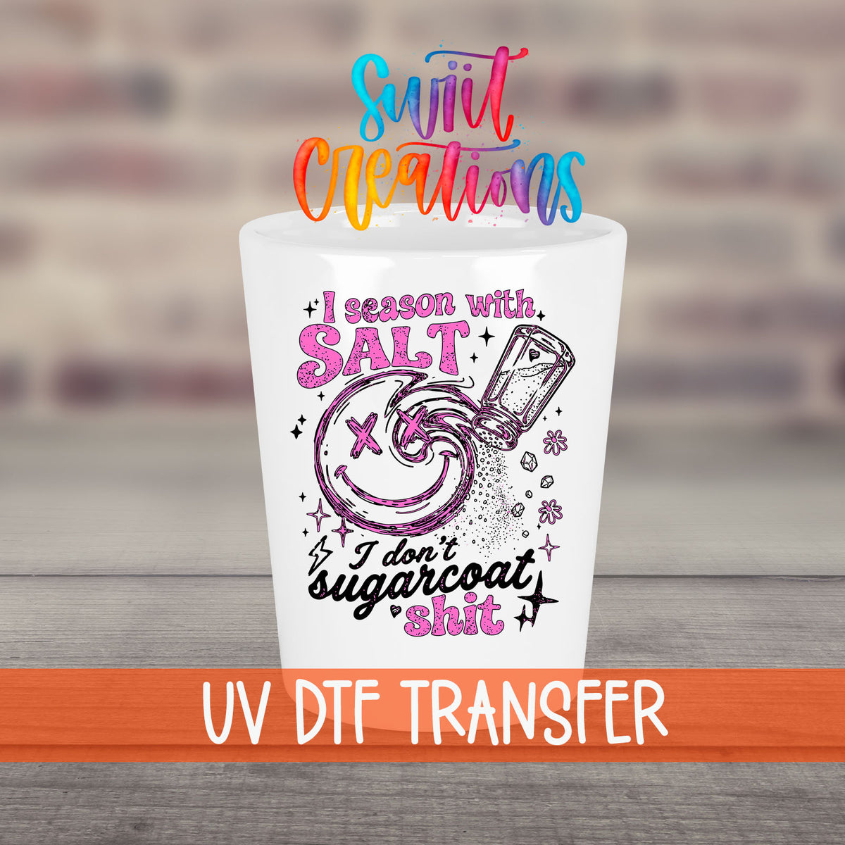 Salt Season Adult Humor UV DTF transfer on a white shot glass in front of a brick wall