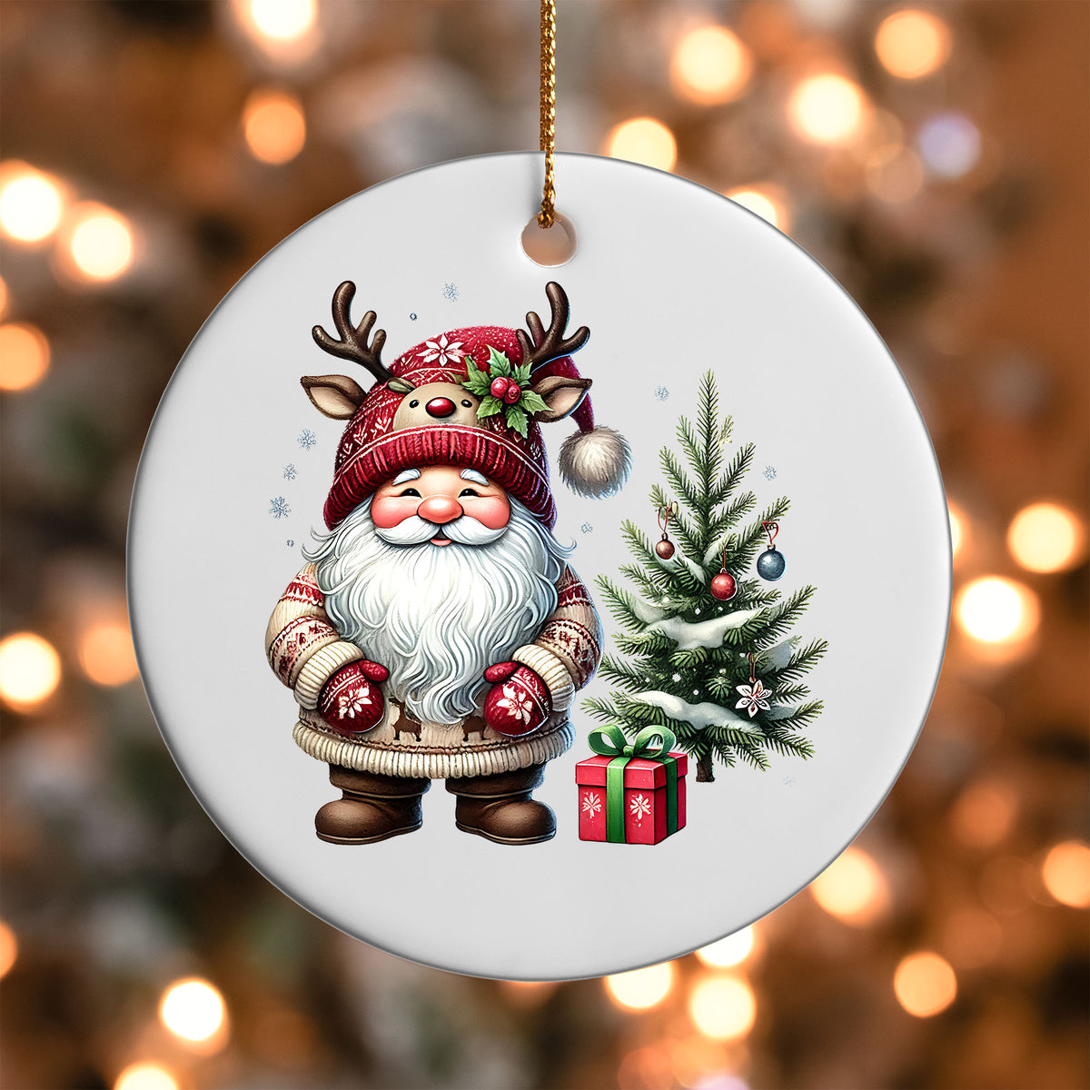 Santa Gnome with Tree and Gift ornament UV DTF transfer on a round white ornament with a bokeh light background