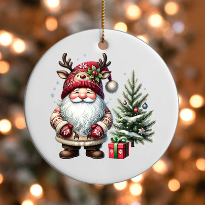 Santa Gnome with Tree and Gift ornament UV DTF transfer on a round white ornament with a bokeh light background