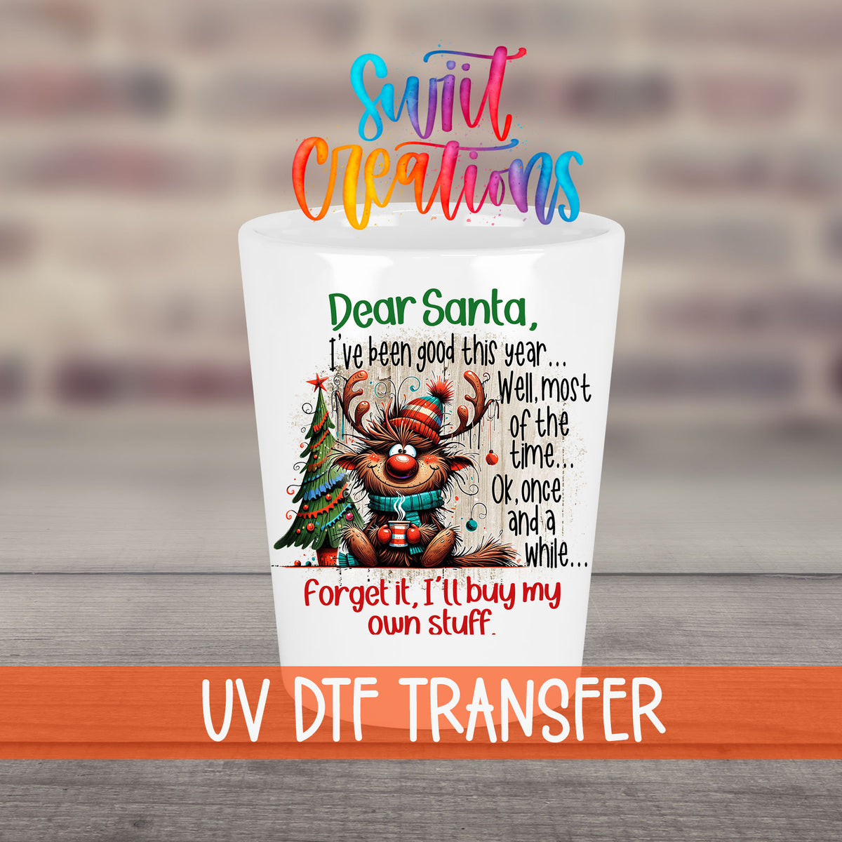 Santa I've Been Good Christmas UV DTF transfer on a white shot glass in front of a brick wall