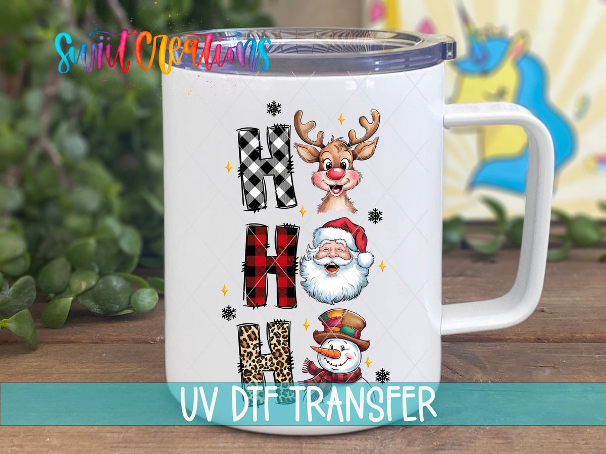 Ho Ho Ho Santa Reindeer Snowman UV DTF transfer on a white stainless steel mug with a lid