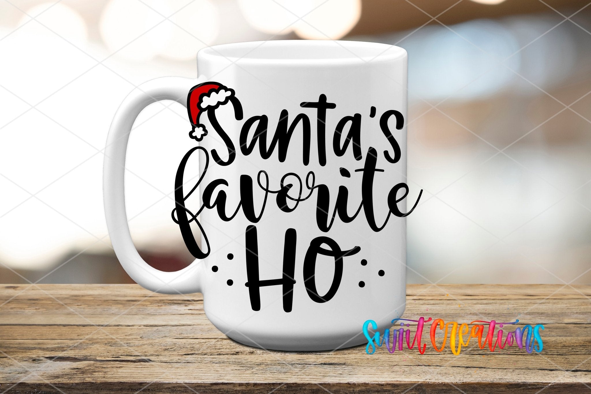 Swiit Creations UV DTF Santa’s Favorite Ho Christmas transfer applied to a white ceramic mug
