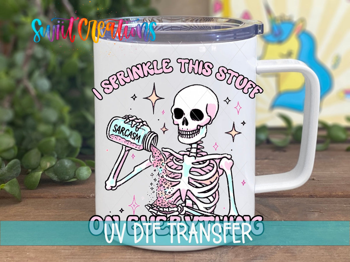 I Sprinkle This Stuff on Everything UV DTF transfer on a white stainless steel mug with a lid