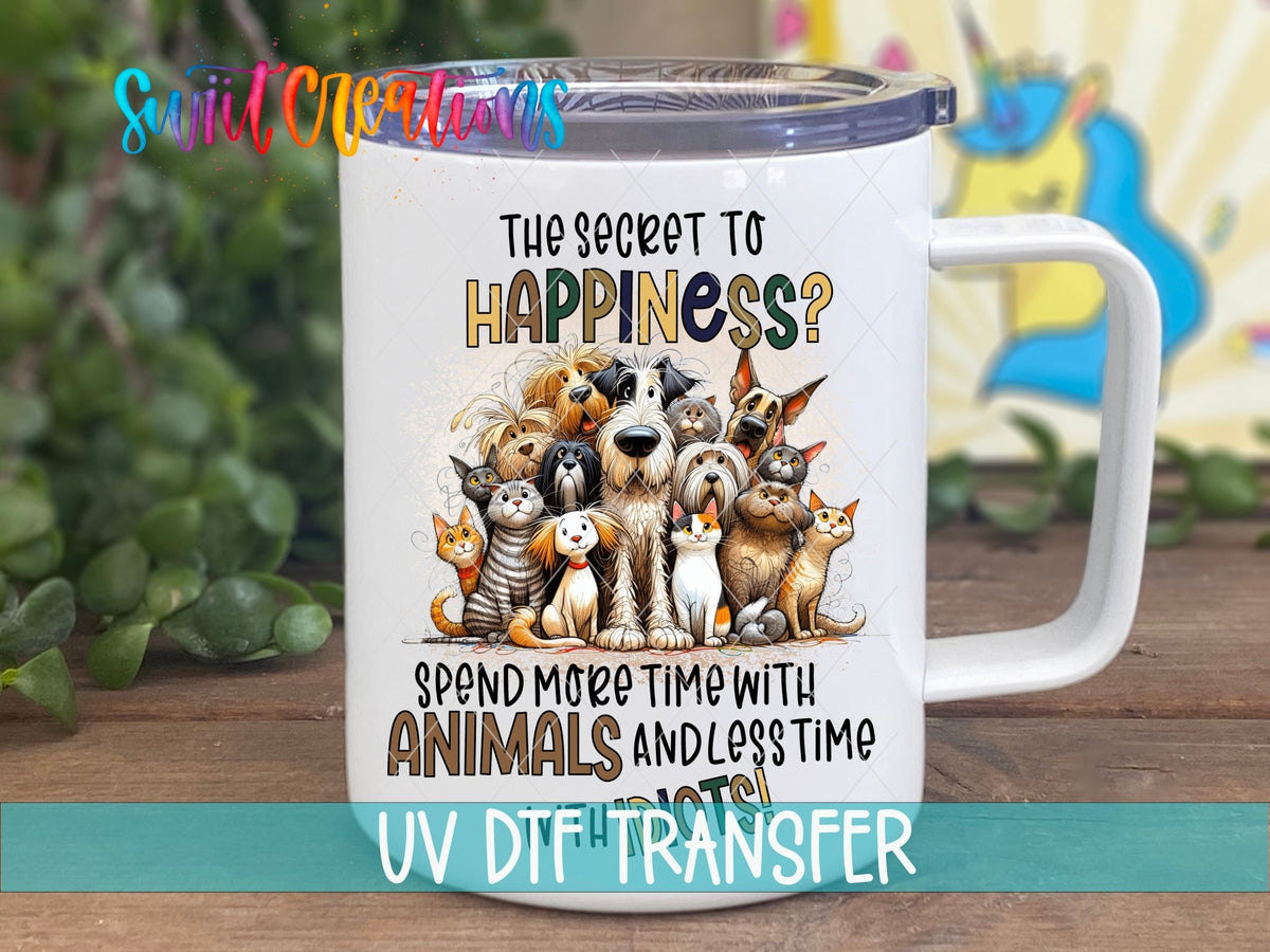 The Secret to Happiness UV DTF transfer on a white stainless steel mug with a lid