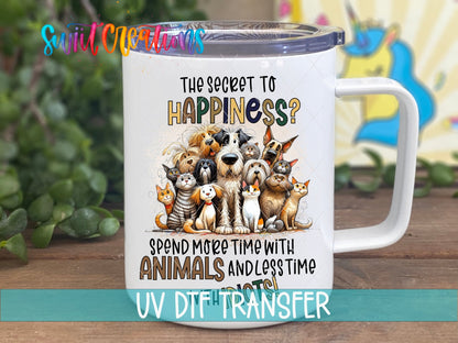 The Secret to Happiness UV DTF transfer on a white stainless steel mug with a lid