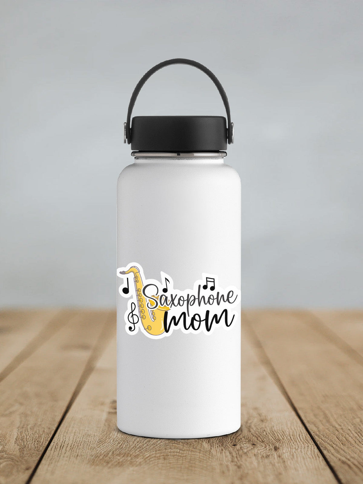 Saxophone Mom sticker on a white insulated water bottle