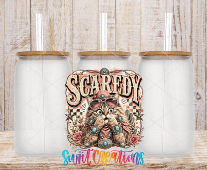 Scaredy Cat Western Cat UV DTF transfer applied to a clear glass can set from Swiit Creations