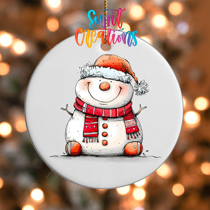Close-up of the Smiling Snowman in Santa Hat UV DTF transfer on a round white ornament