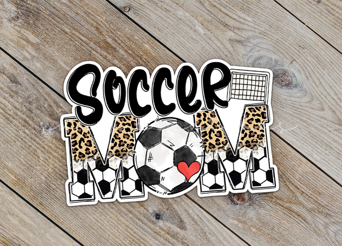 Close-up of the Soccer Mom sticker on rustic wood