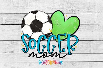 Soccer Mom blue letters and green heart UV DTF wrap artwork on a white wood background