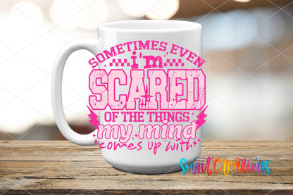 Sometimes Even I'm Scared pink letters UV DTF transfer on a white ceramic coffee mug